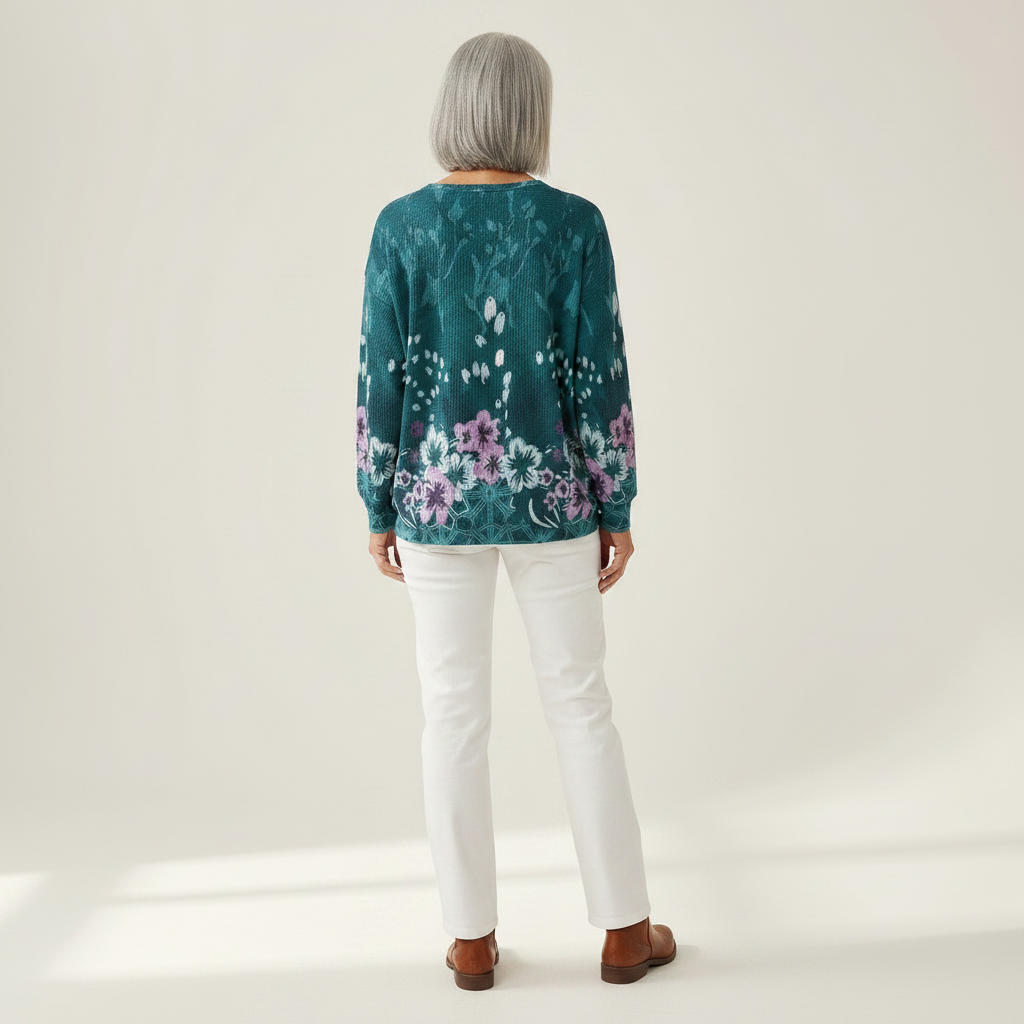 Yolande – Türkiser Pulli mit Blümchen