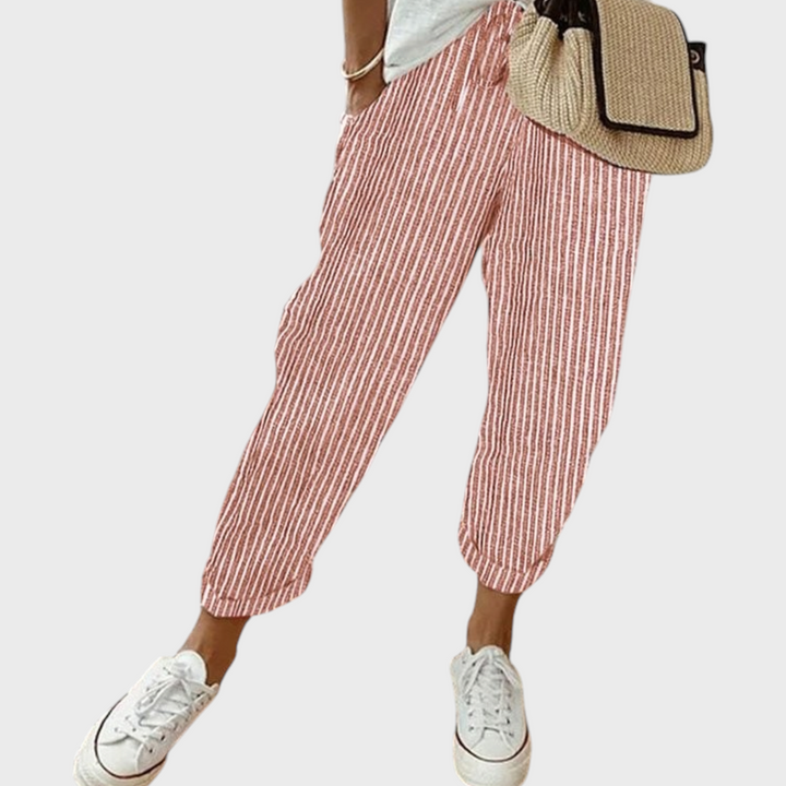 Calças Liselotte Salzburg às riscas cor-de-rosa e brancas com cintura elástica, corte largo e bolsos laterais.