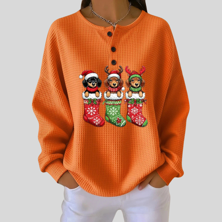 Gabrielle – Weihnachtspullover mit Welpen in Socken