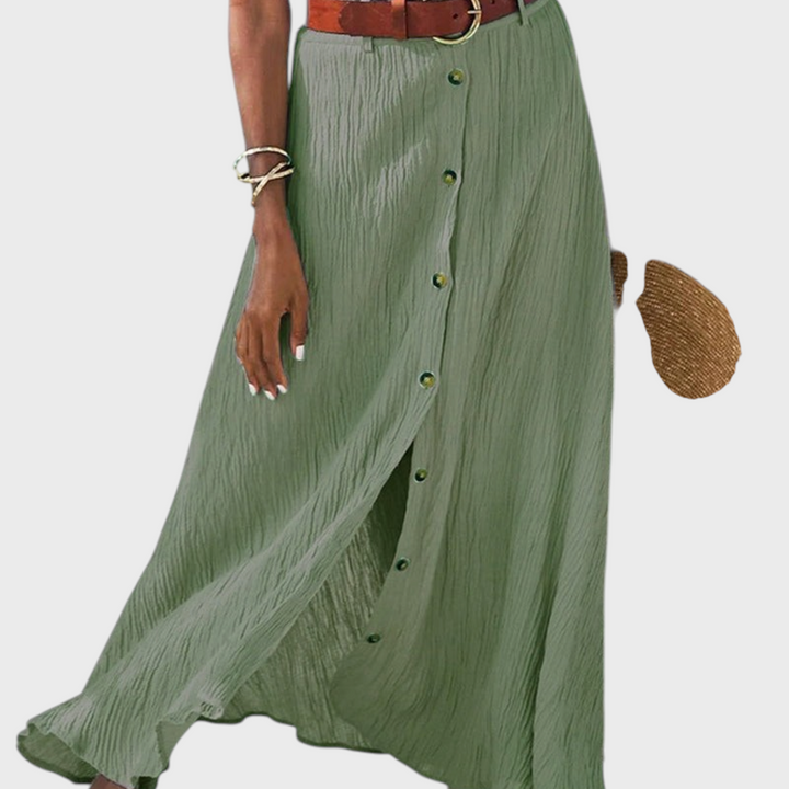 Saia midi verde Liselotte Salzburg com botões frontais, cintura alta e tecido leve, ideal para um look de verão.