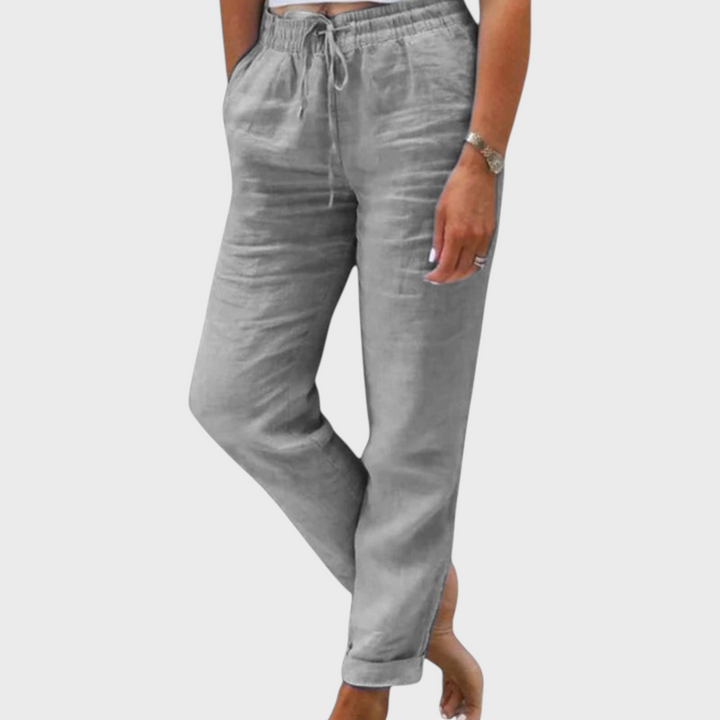 Calças cinzentas Liselotte Salzburg com cintura elástica e cordão, estilo casual elegante em tecido leve.