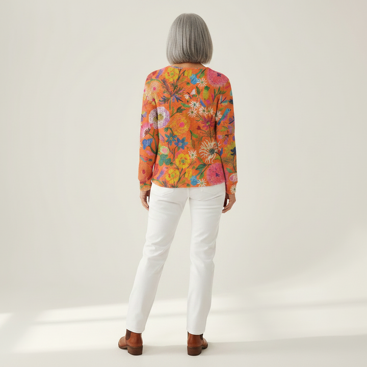 Florence – Orangefarbener Pulli mit Blumen