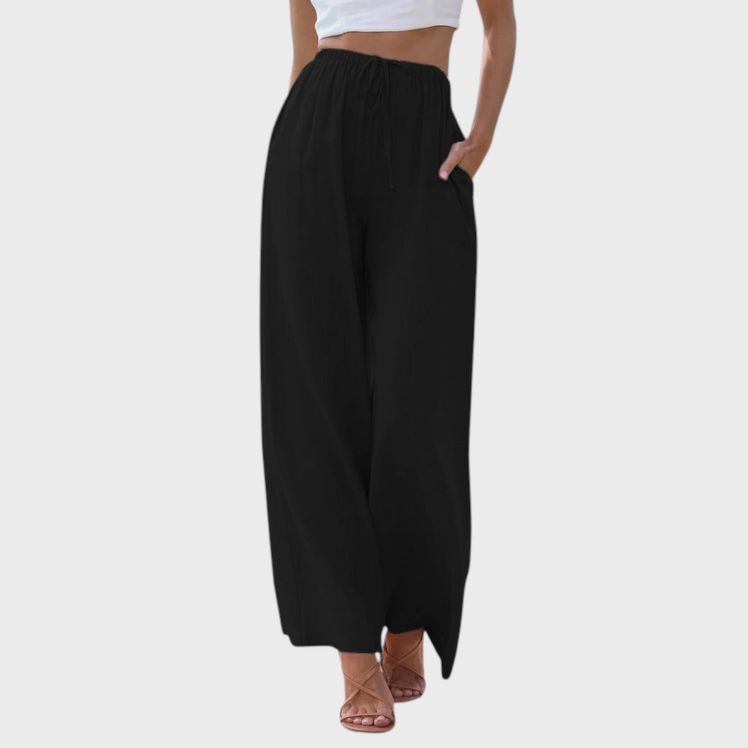Calças largas pretas Liselotte Salzburg com cintura ajustável e bolsos laterais, estilo casual de verão em poliéster