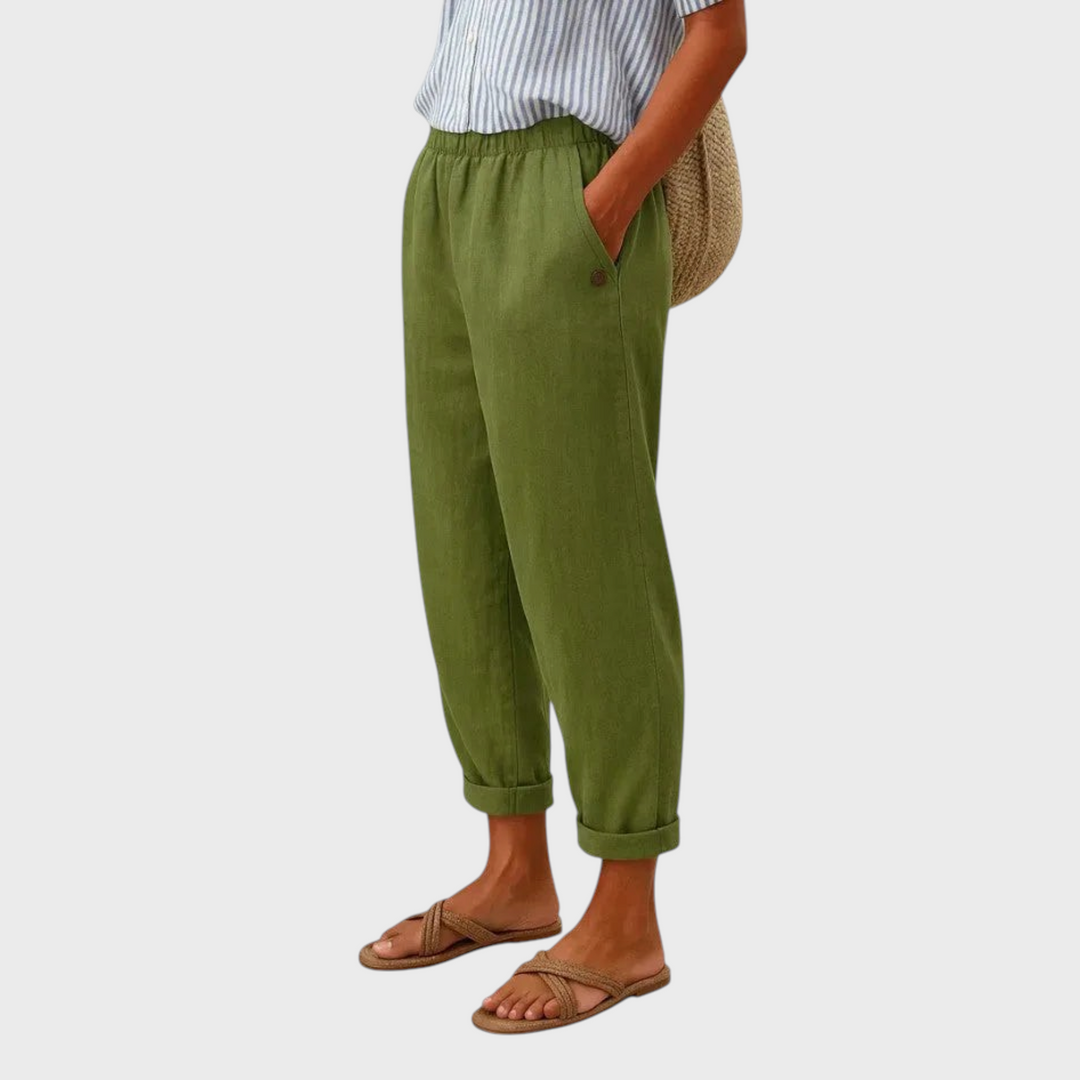 Calças Liselotte Salzburg verdes de corte casual com cintura elástica e bolsos, ideais para um look confortável.