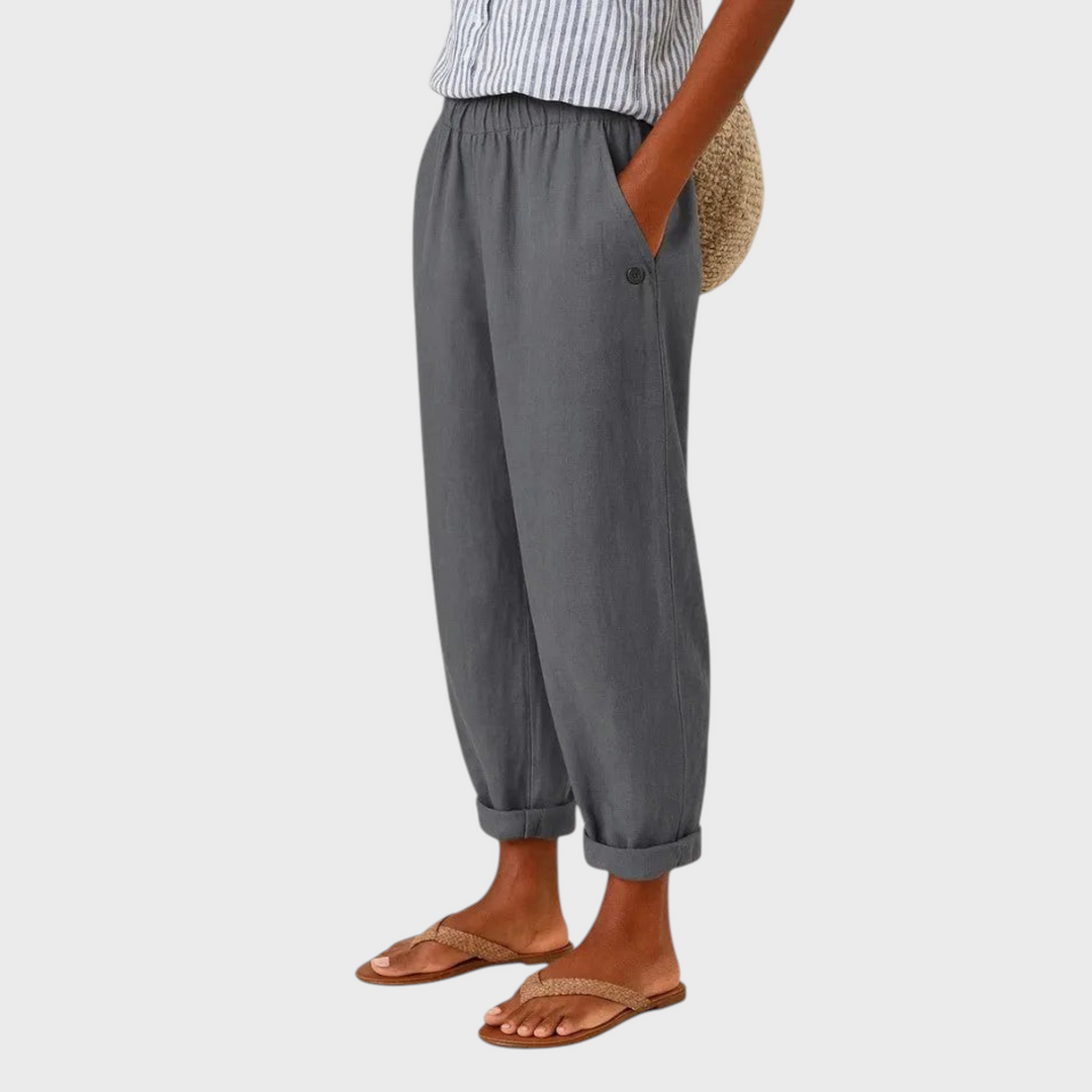 Calças cinzentas Liselotte Salzburg com corte descontraído, cintura elástica e bainhas dobradas para um look casual.