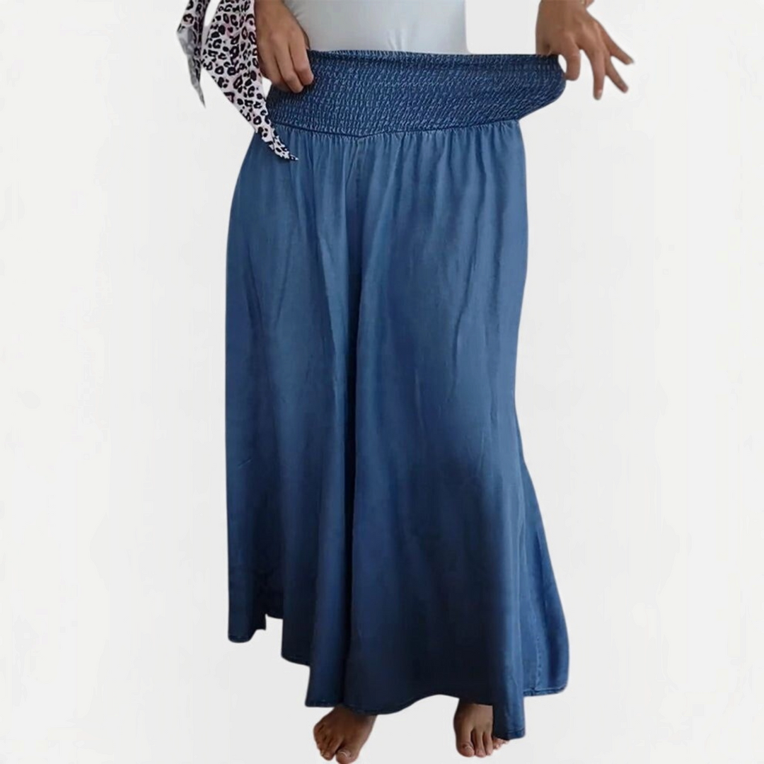 Calças largas Liselotte Salzburg em ganga azul com cintura elástica alta e estilo boho fluido