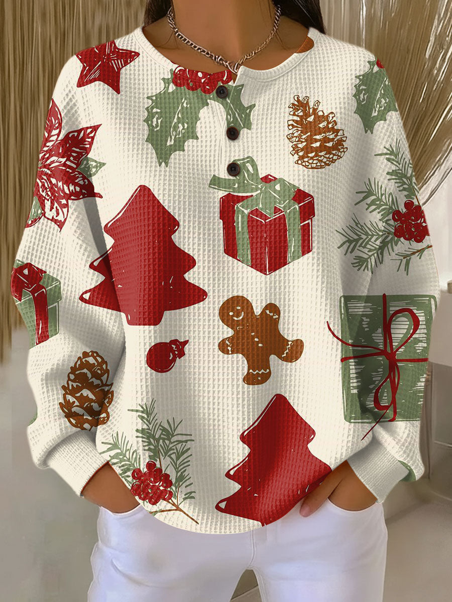 Olivia – Weihnachtspullover mit Tannenbäumen und Geschenken