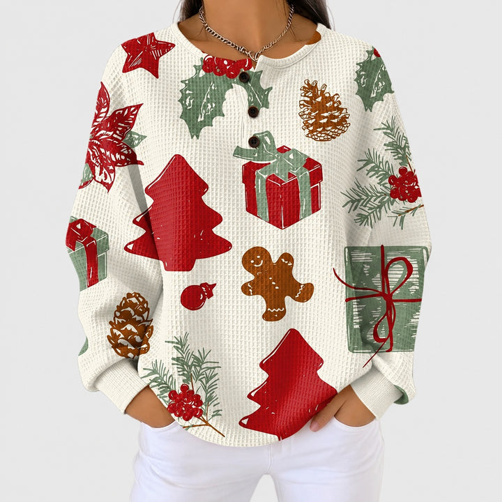 Olivia – Weihnachtspullover mit Tannenbäumen und Geschenken